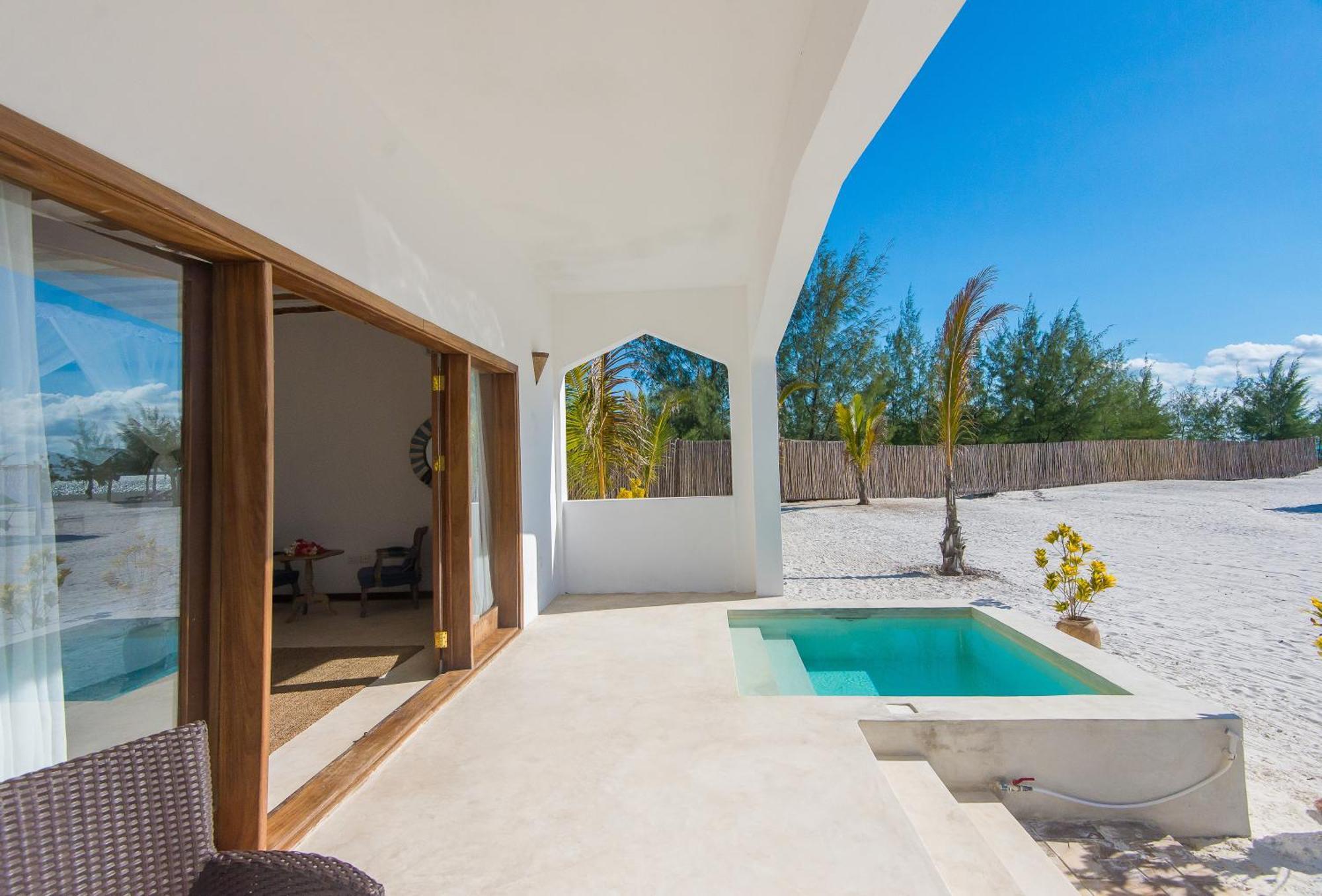 Konokono Beach Resort And Isaraya Luxury Overwater Villas Michamvi Quarto foto